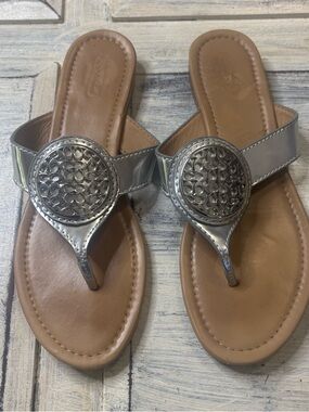 Coach Women’s Silver Metallic Thong Sandals with Medallion Accent